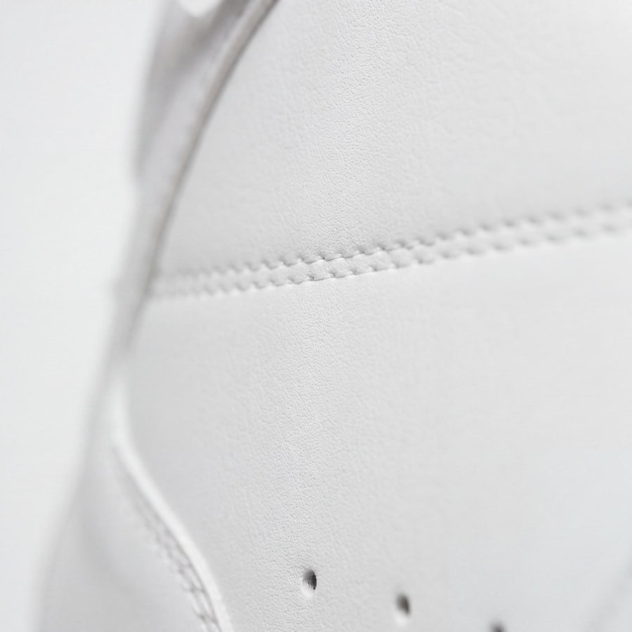 The surface grain of the premium microfibre upper, in close-up.